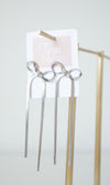 long bow earrings