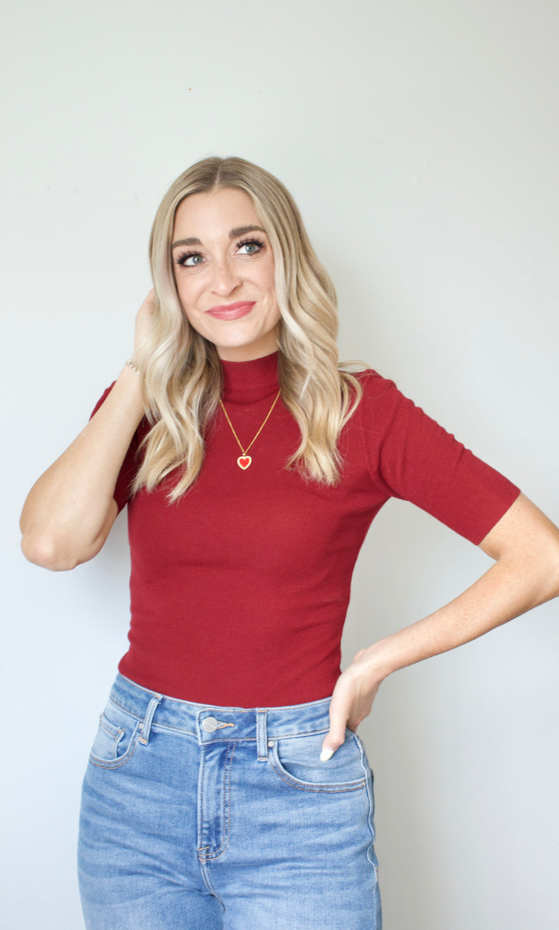 oxblood mock neck knit top