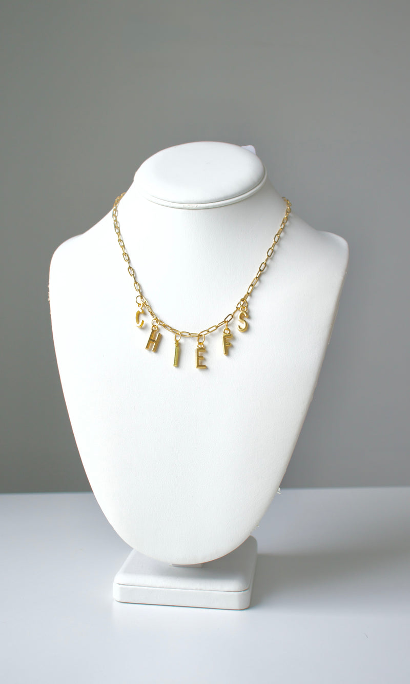 gold chiefs charm necklace